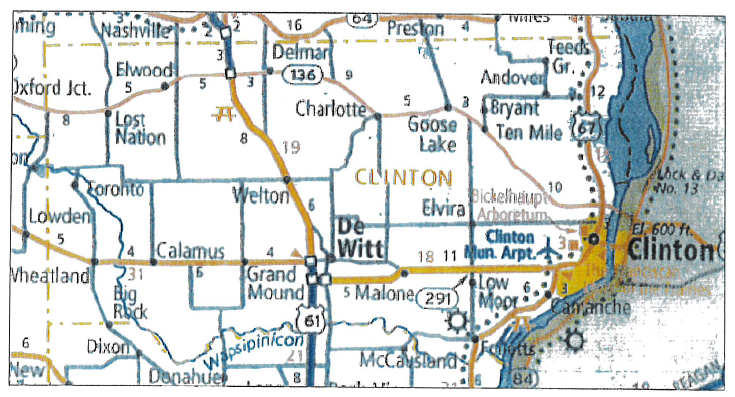 Map showing Clinton County, Iowa, including cities and towns such as Clinton, De Witt, Camanche, Grand Mound, Lost Nation, Welton, and Goose Lake. Major roads include U.S. Highway 30, U.S. Highway 61, and State Highway 136. Landmarks such as the Clinton Municipal Airport, Wapsipinicon River, and Bickelhaupt Arboretum are also indicated.